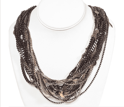 Beaded and Swarovski adorned crystal necklace in gun metal and 18kt gold plated. Black ematite jet necklace.