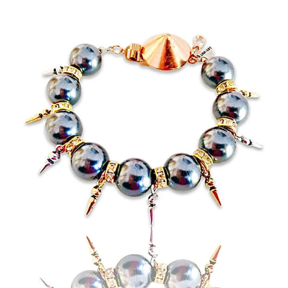 Handmade statement bracelet with black pearls, Swarovski crystals, rhinestones and gold, silver, rose gold plated brass.